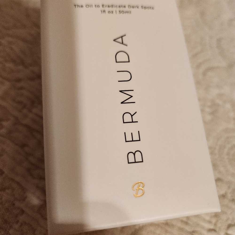 BERMUDA OIL  to eradicate dark spots.